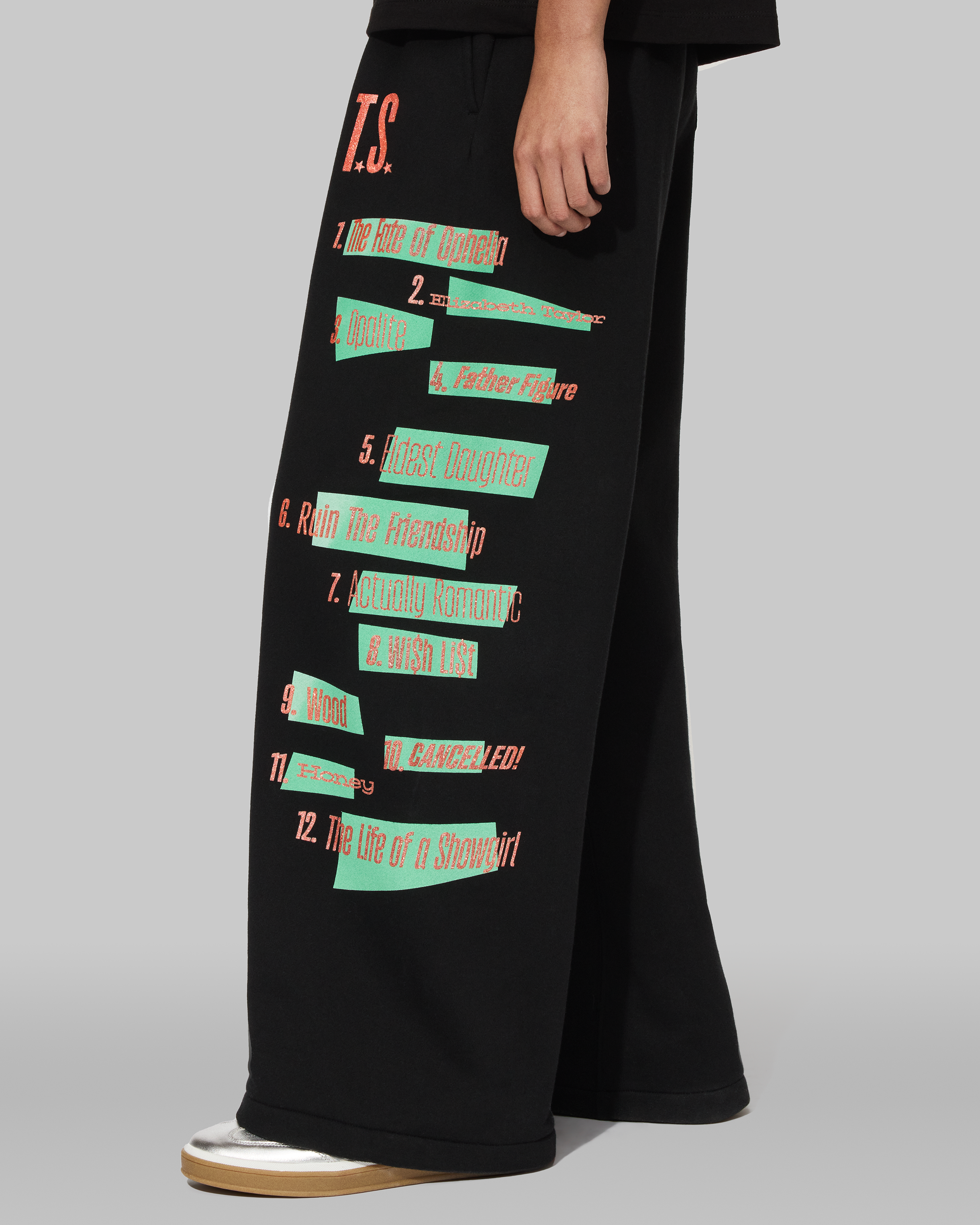 The Life of a Showgirl Tracklist Black Sweatpants Side 2 on Model