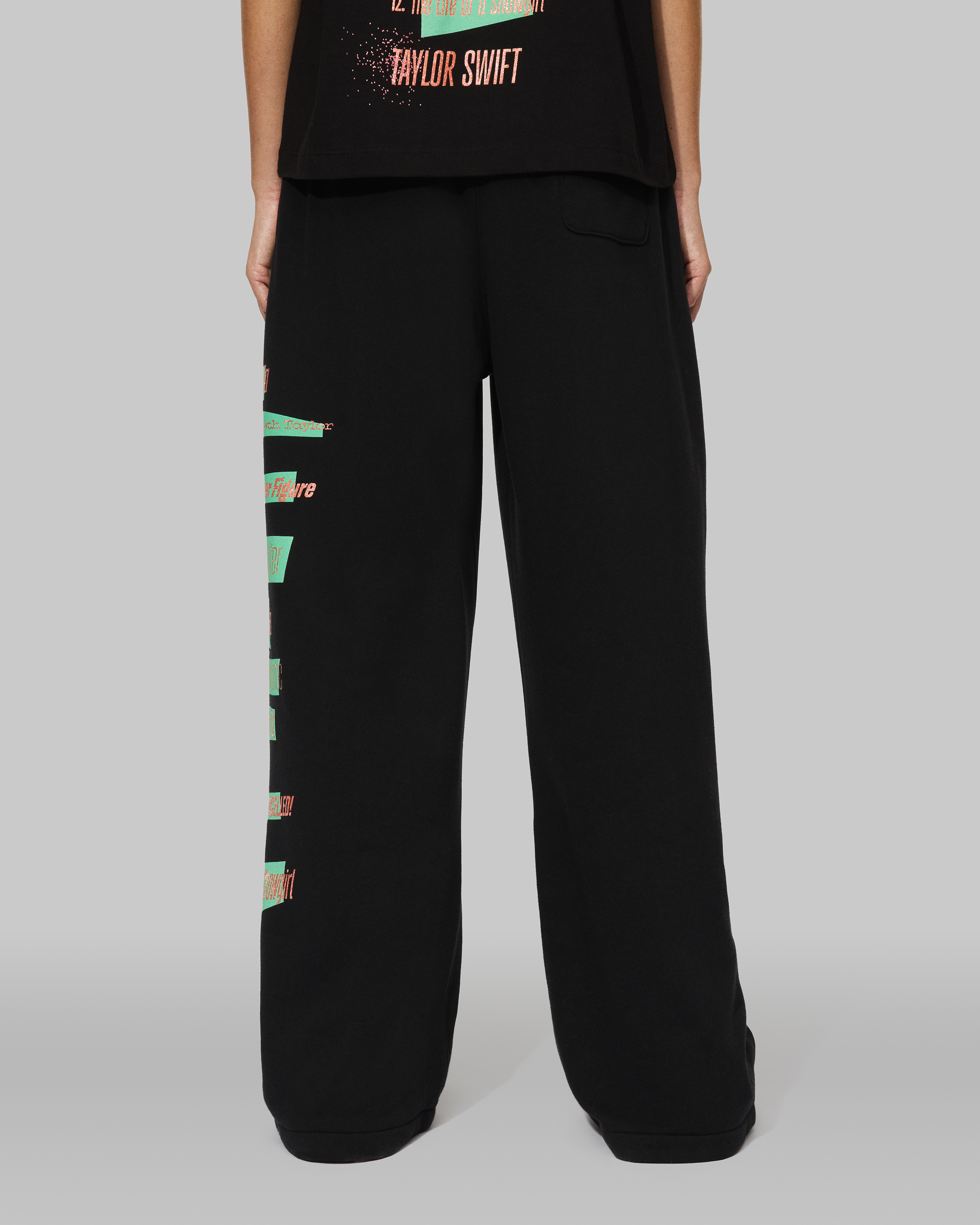 The Life of a Showgirl Tracklist Black Sweatpants Back on Model