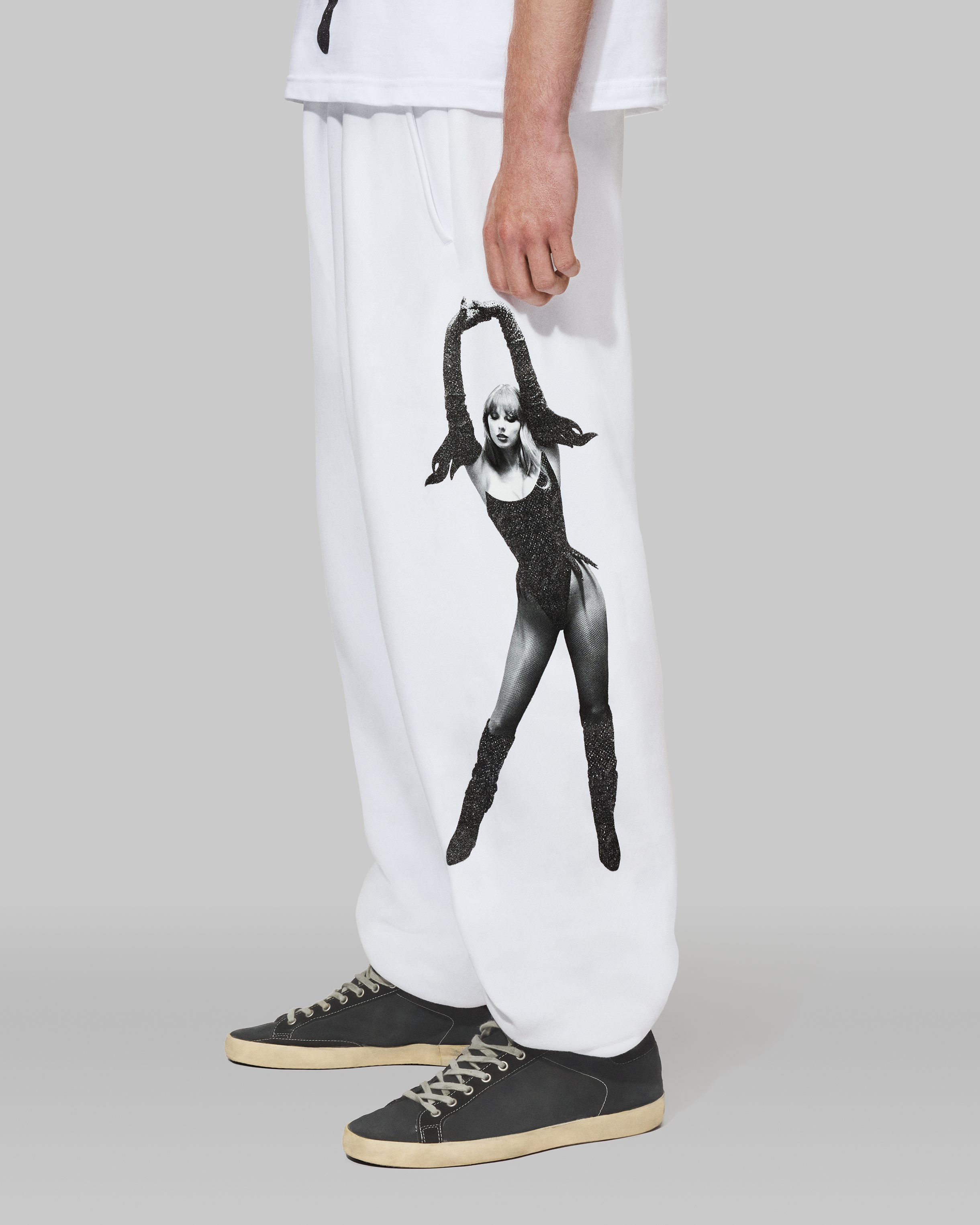 The Life of a Showgirl Shiny Bug White Sweatpants Side on Model